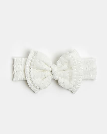 Baby girls cream broderie bow headband