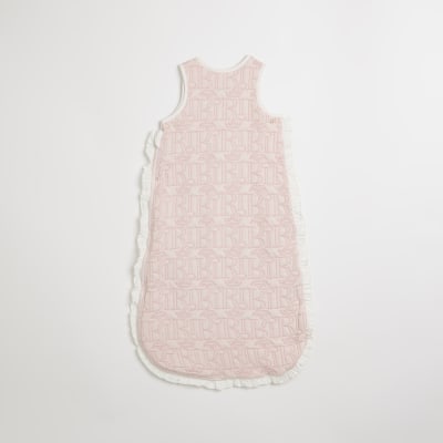 Baby girls pink RI monogram frill sleepbag