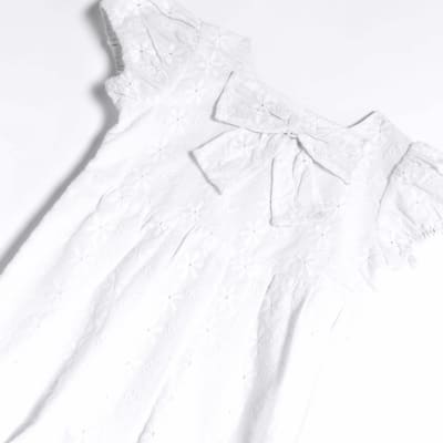 Baby girls white broderie bow romper