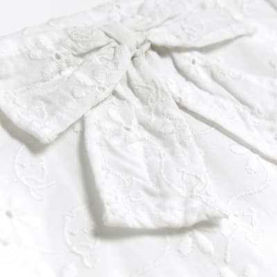 Baby girls white broderie bow romper