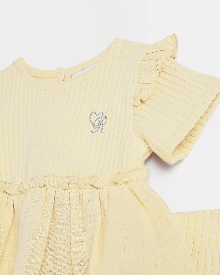 Baby girls yellow peplum textured rib outfit