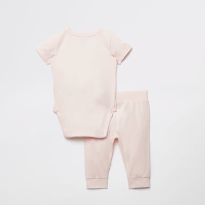 baby pink bodysuit