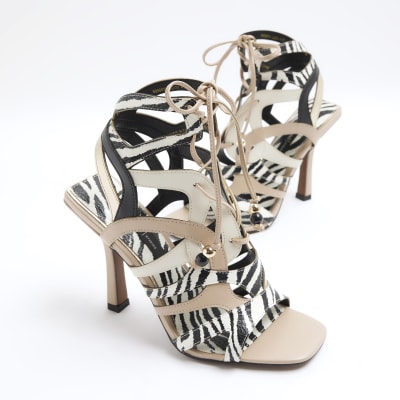 Beige animal print caged heeled sandals River Island