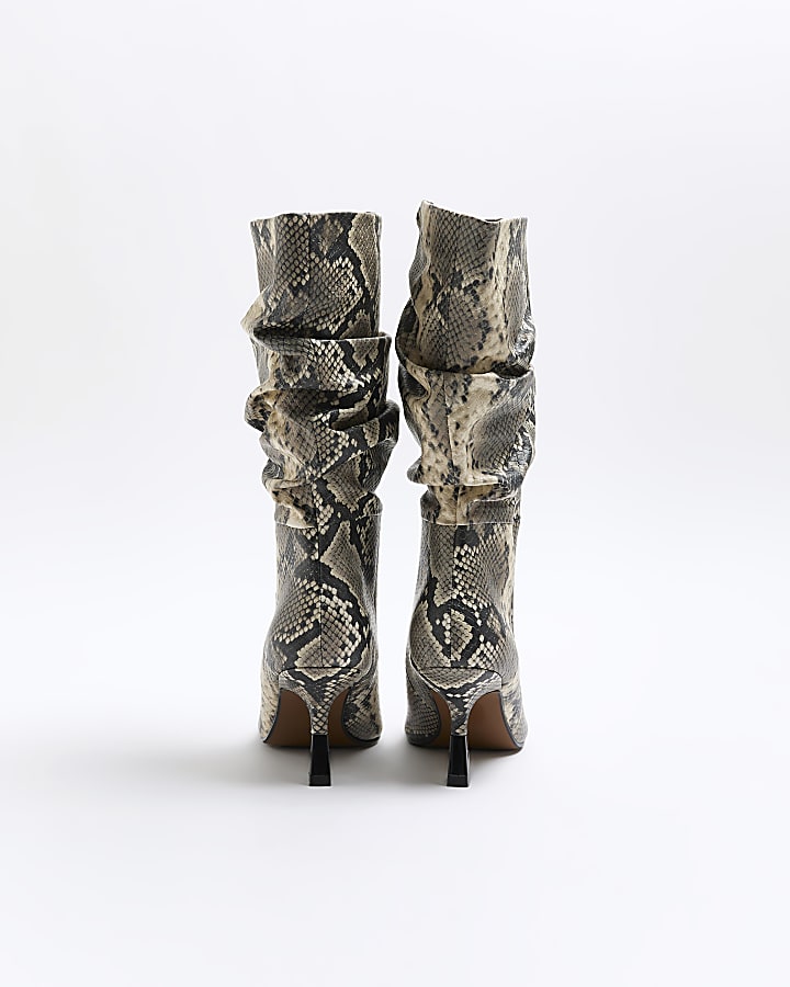 Beige animal print slouch heeled boots
