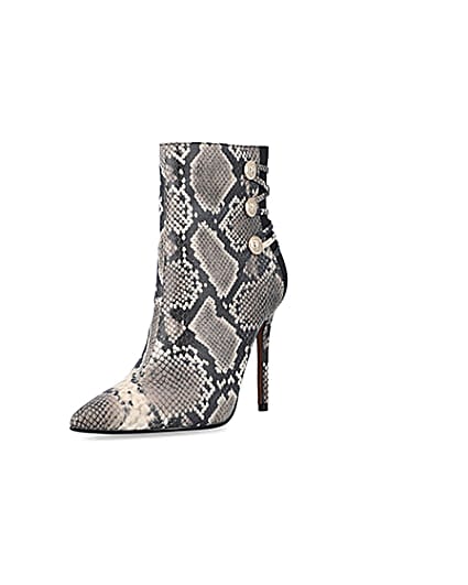 360 degree animation of product Beige animal print tie up heeled boots frame-0
