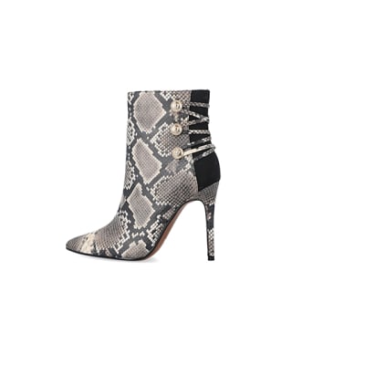 360 degree animation of product Beige animal print tie up heeled boots frame-4