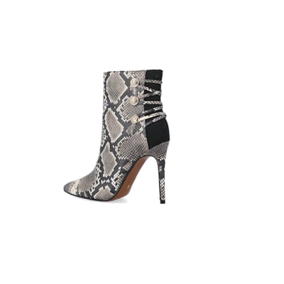 360 degree animation of product Beige animal print tie up heeled boots frame-5