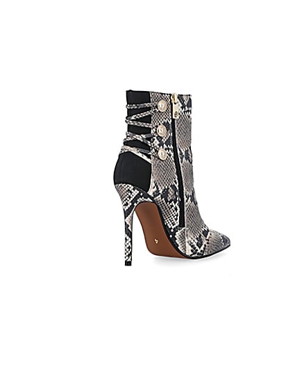 360 degree animation of product Beige animal print tie up heeled boots frame-12