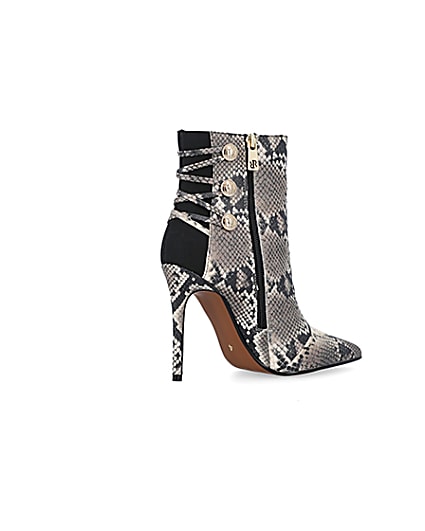 360 degree animation of product Beige animal print tie up heeled boots frame-13