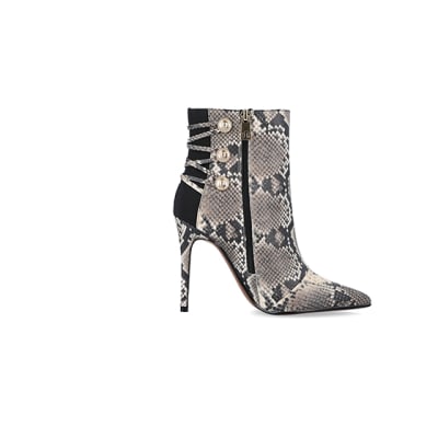 360 degree animation of product Beige animal print tie up heeled boots frame-15