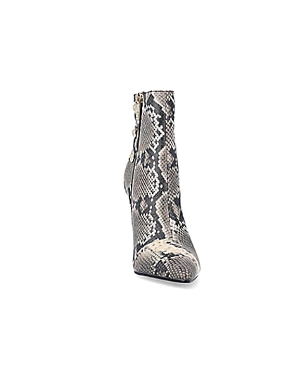 360 degree animation of product Beige animal print tie up heeled boots frame-20
