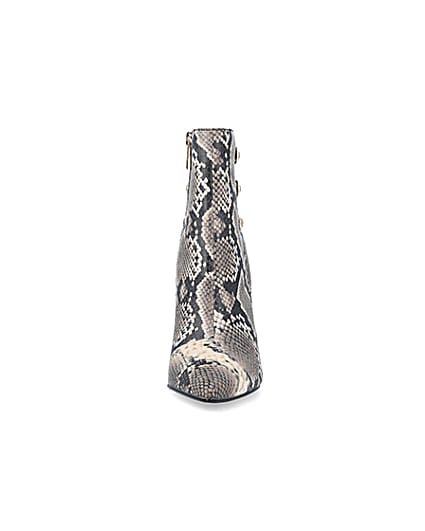 360 degree animation of product Beige animal print tie up heeled boots frame-21