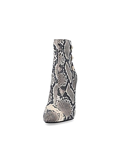 360 degree animation of product Beige animal print tie up heeled boots frame-22