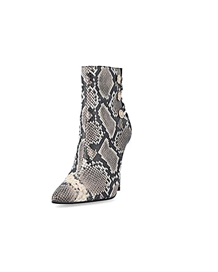 360 degree animation of product Beige animal print tie up heeled boots frame-23