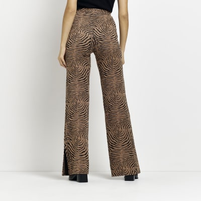 Beige animal print wide leg trousers River Island