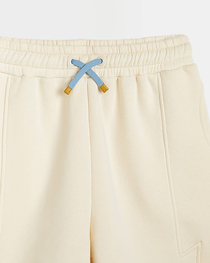 Beige bolt seam detail shorts