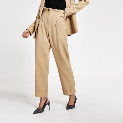 beige tapered trousers