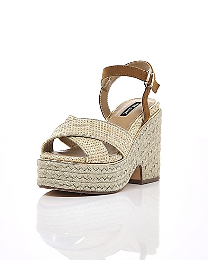 360 degree animation of product Beige cross strap espadrille wedges frame-1