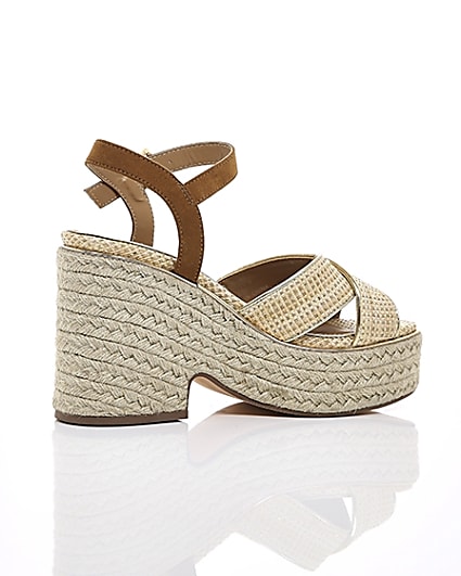 360 degree animation of product Beige cross strap espadrille wedges frame-11