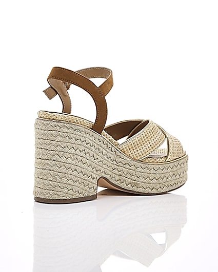 360 degree animation of product Beige cross strap espadrille wedges frame-12