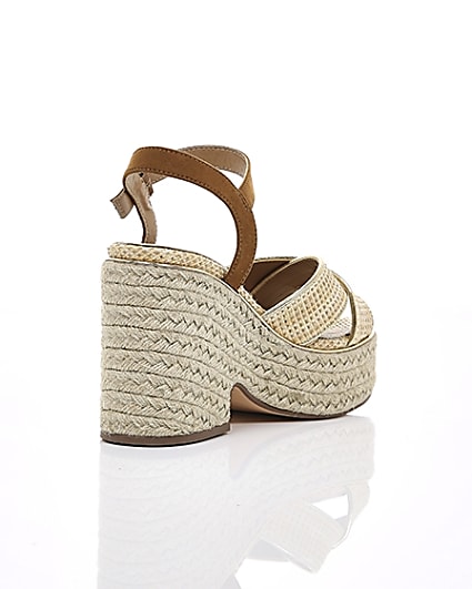 360 degree animation of product Beige cross strap espadrille wedges frame-13
