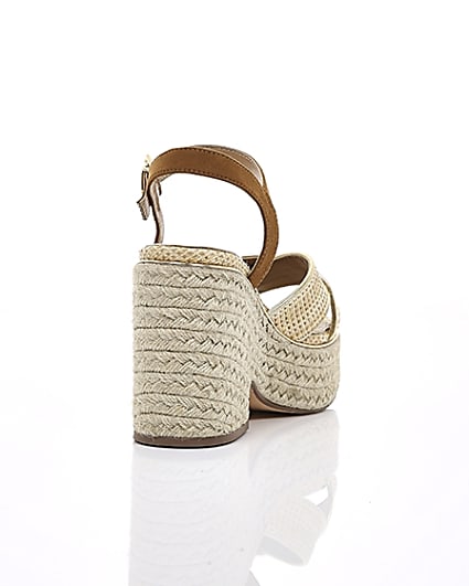 360 degree animation of product Beige cross strap espadrille wedges frame-14