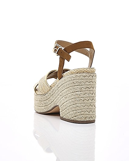 360 degree animation of product Beige cross strap espadrille wedges frame-17