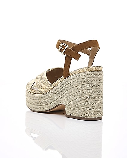 360 degree animation of product Beige cross strap espadrille wedges frame-18