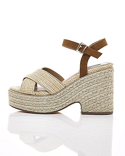 360 degree animation of product Beige cross strap espadrille wedges frame-21