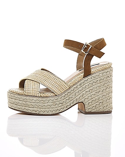 360 degree animation of product Beige cross strap espadrille wedges frame-22