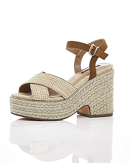 360 degree animation of product Beige cross strap espadrille wedges frame-23