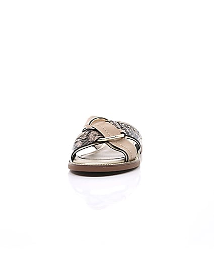 360 degree animation of product Beige cross strap ring flat sandals frame-3