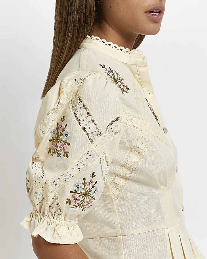 Beige embroidered floral shirt