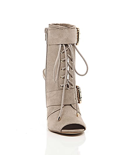 360 degree animation of product Beige eyelet buckle lace-up shoe boots frame-5