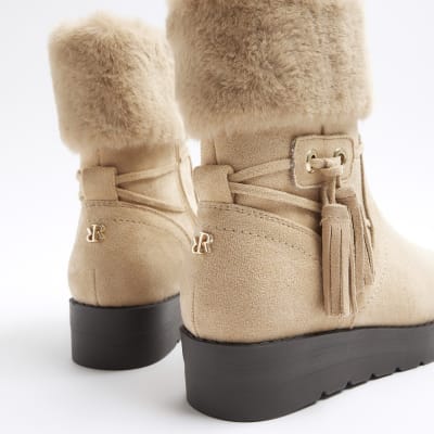 Beige faux fur lining wedge boots River Island