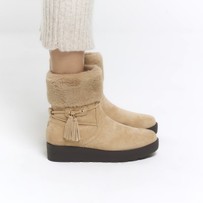 Beige faux fur lining wedge boots River Island