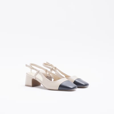 Beige heeled slingback shoes