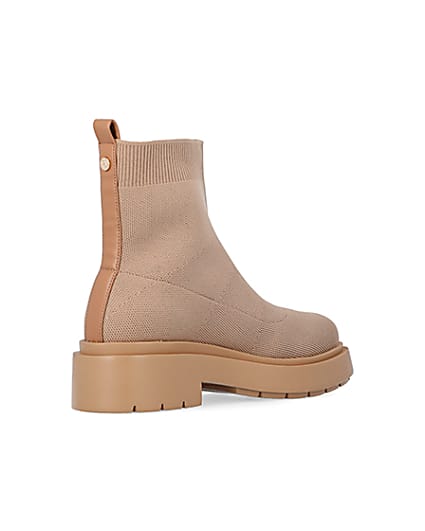360 degree animation of product Beige knitted chunky ankle boots frame-12