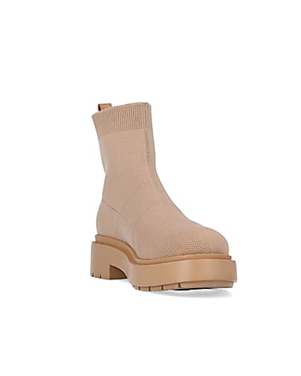 360 degree animation of product Beige knitted chunky ankle boots frame-19