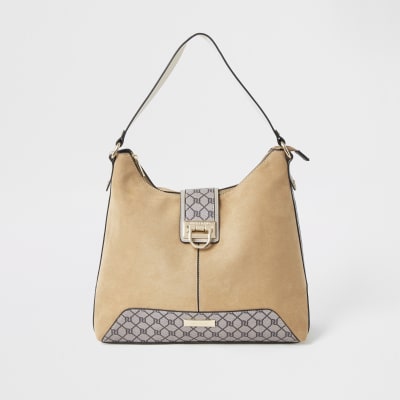 Beige lock front slouch bag | River Island