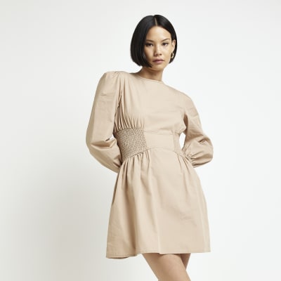 Beige long sleeve shirred waist mini dress