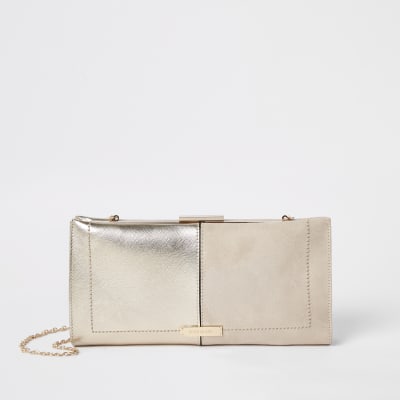 Beige metallic clip top clutch bag