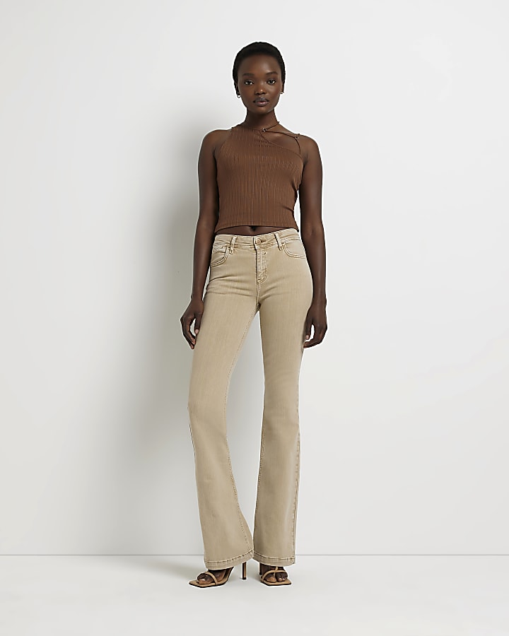 Beige mid rise flare jeans