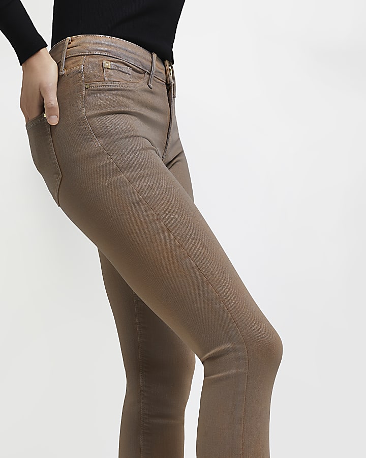 Beige Molly coated mid rise skinny jeans