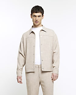 Beige oversized fit textured jacket