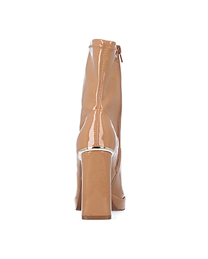 360 degree animation of product Beige patent heeled ankle boots frame-9