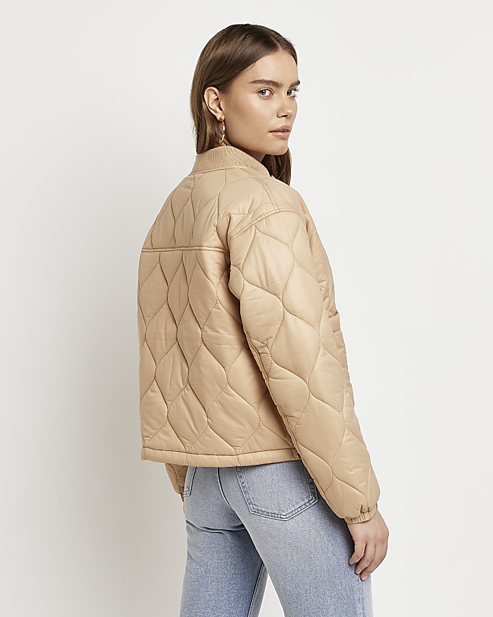Beige quilted padded jacket