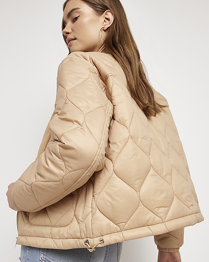 Beige quilted padded jacket