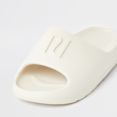 Beige RI branded sliders