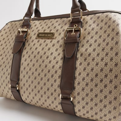 Beige RI monogram barrel travel bag